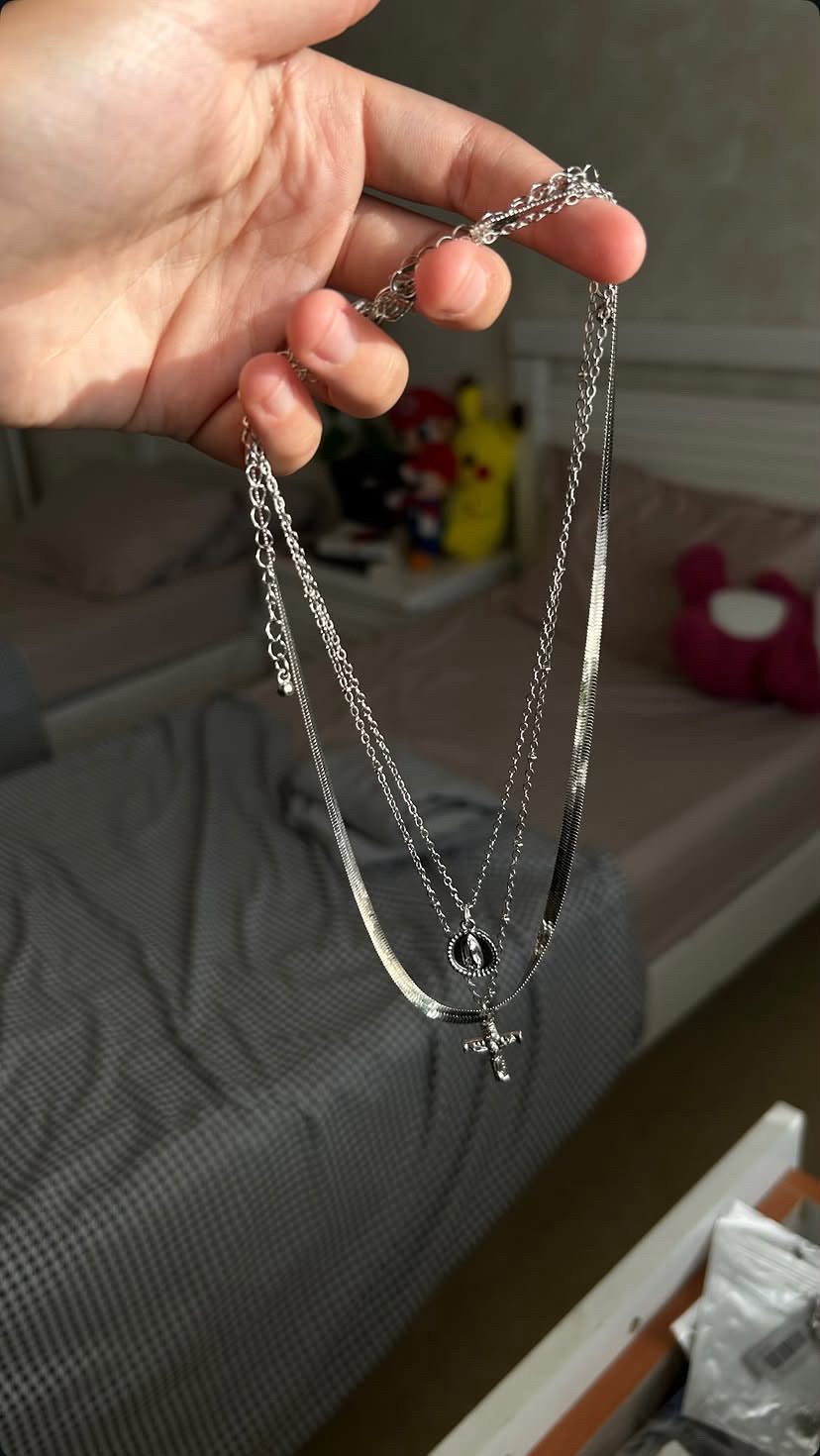 Layered silver necklace collection